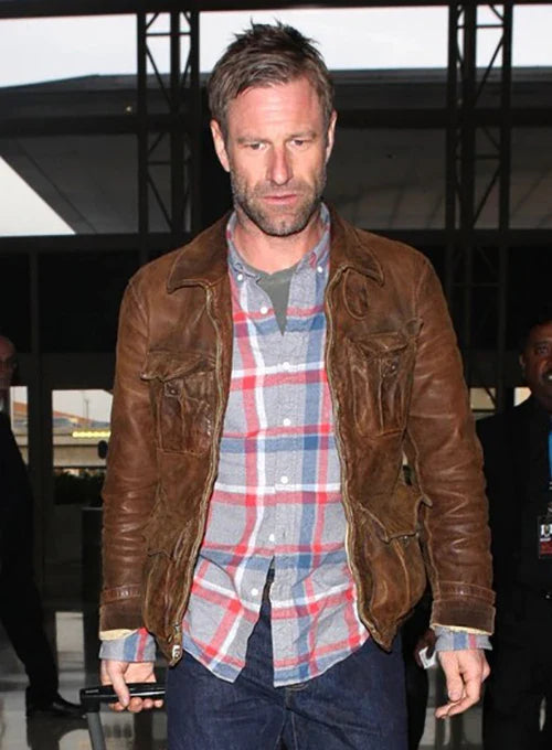 Sophisticated leather outerwear worn by Aaron Eckhart