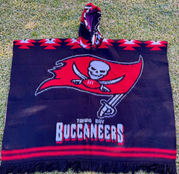 Hooded towel with Tampa Bay Buccaneers logo on grass