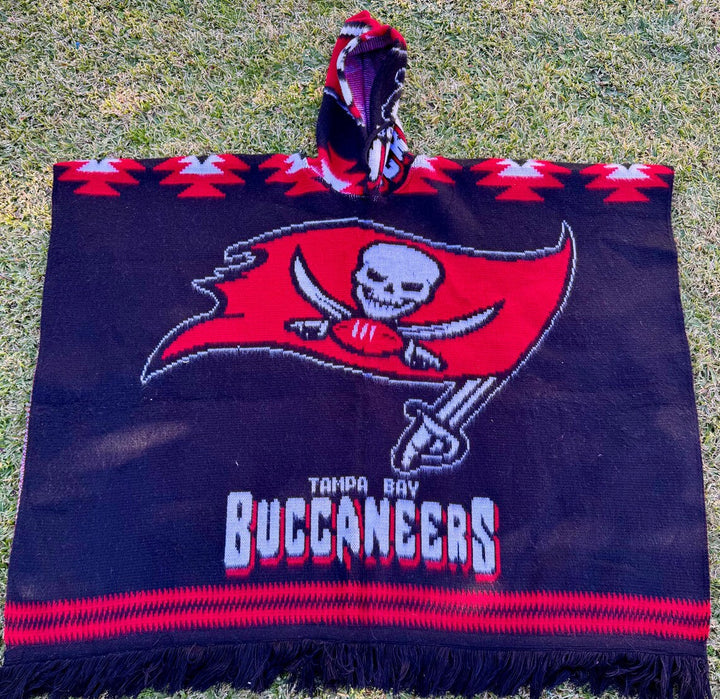 Hooded towel with Tampa Bay Buccaneers logo on grass